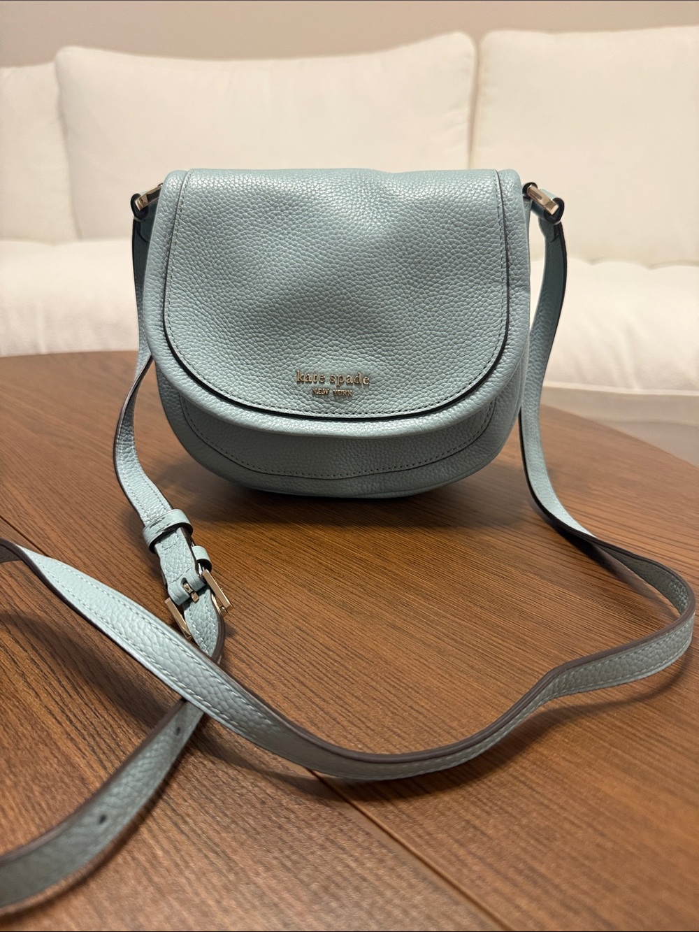kate spade light blue pebbled leather small saddle crossbody
